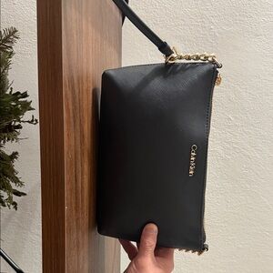 Calvin Klein Black Crossbody Bag with Gold Accents